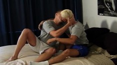 Two lustful gay friends hook up on the bed and enjoy hard anal action