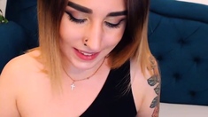 Tattooed Babe Fucks Her Pussy